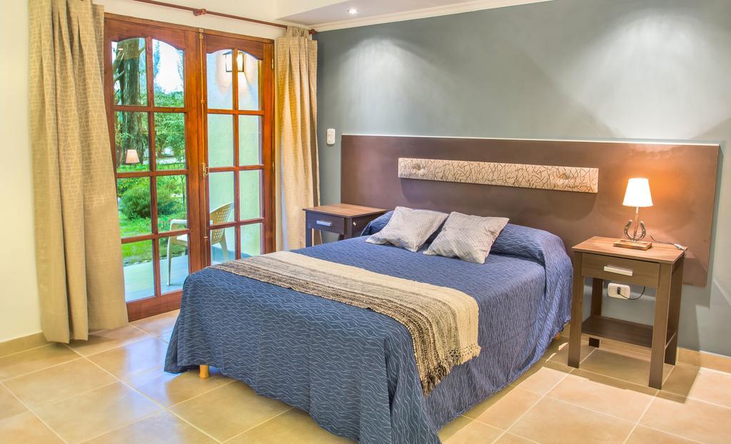 Aparthotel Blumenau Villa General Belgrano Zimmer foto